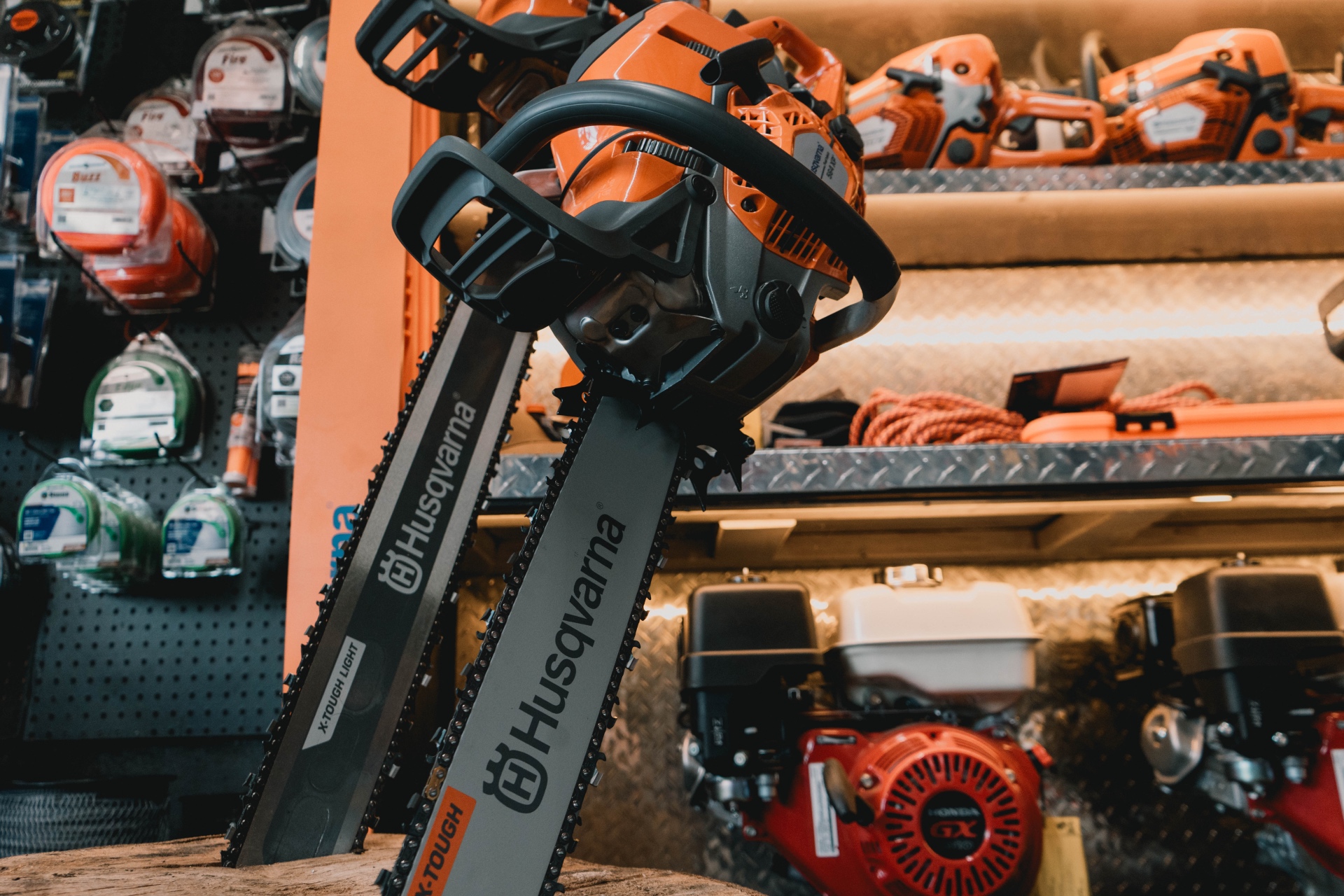 Husqvarna chainsaws on display inside the store