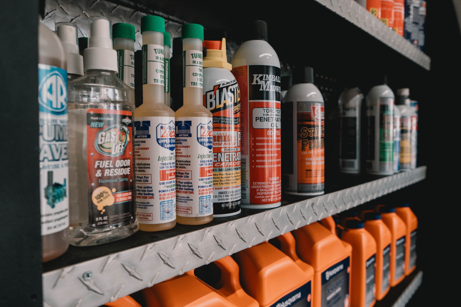 Shelves of fuel treatments, oils and shop supplies